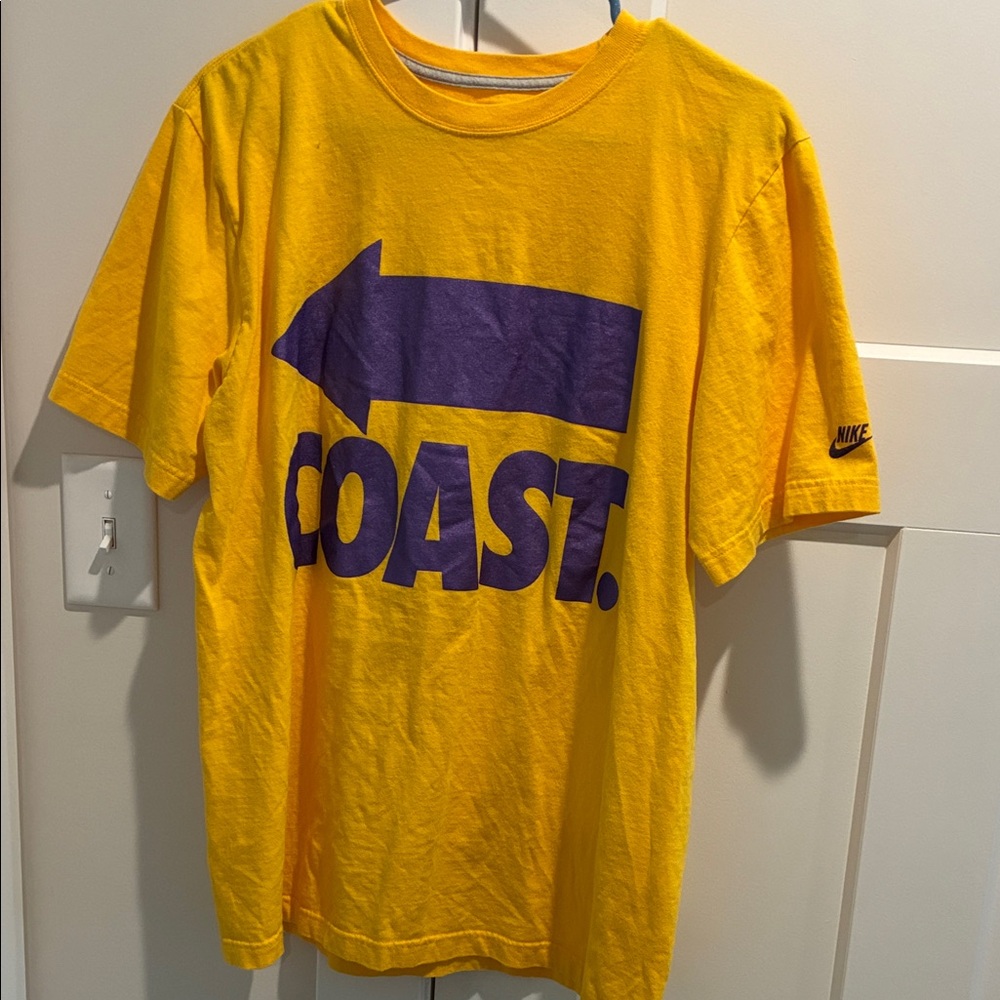 Nike Men's Yellow Tee with Purple Coast Graphic
